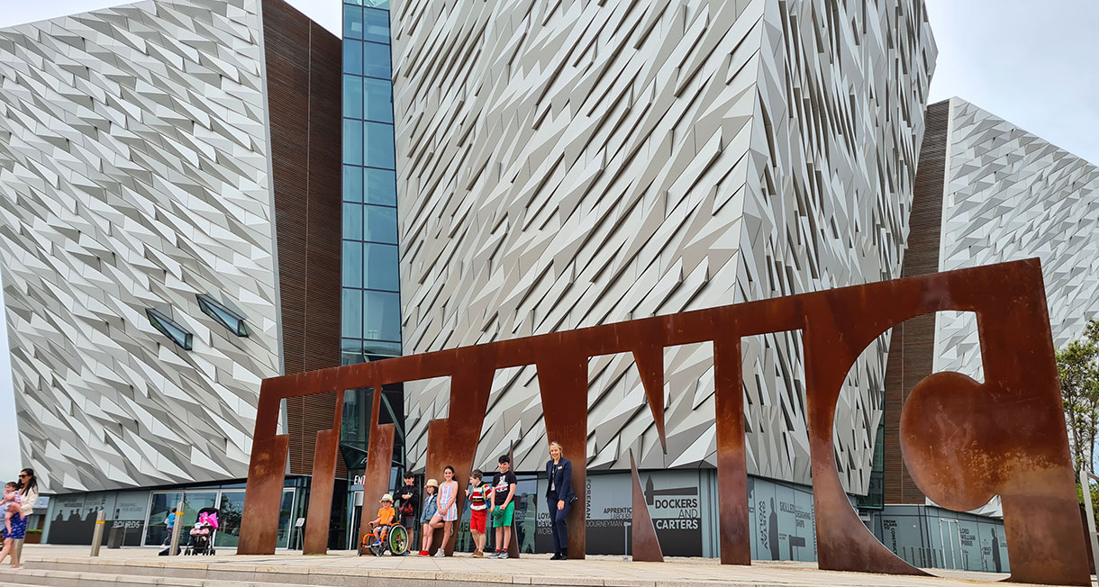 Adam King and friends and family outside Titanic Belfast